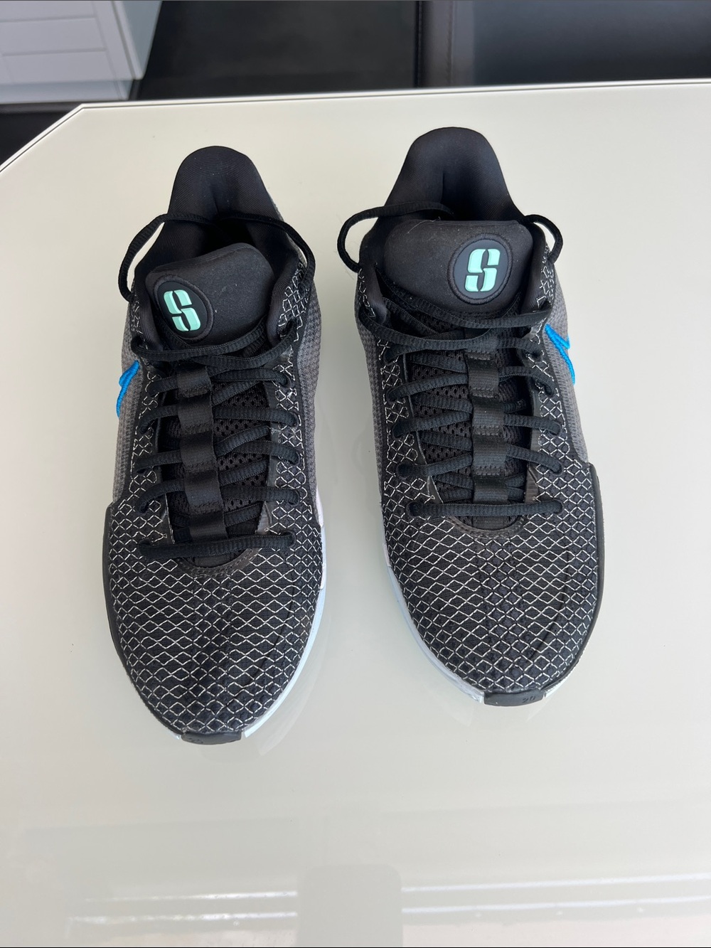 Nike Black Sneakers with Teal Accent